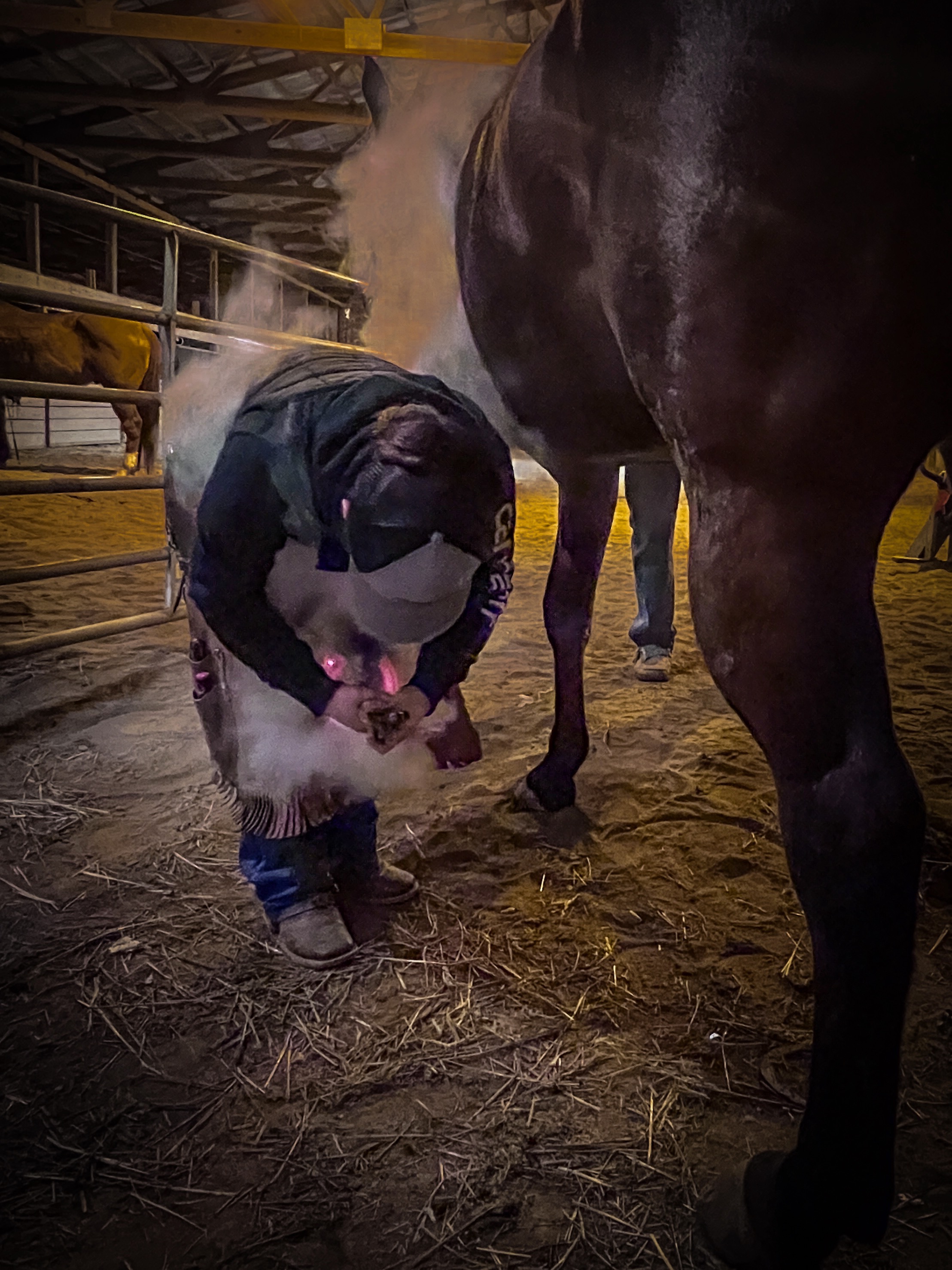 Hot shoeing in the barn